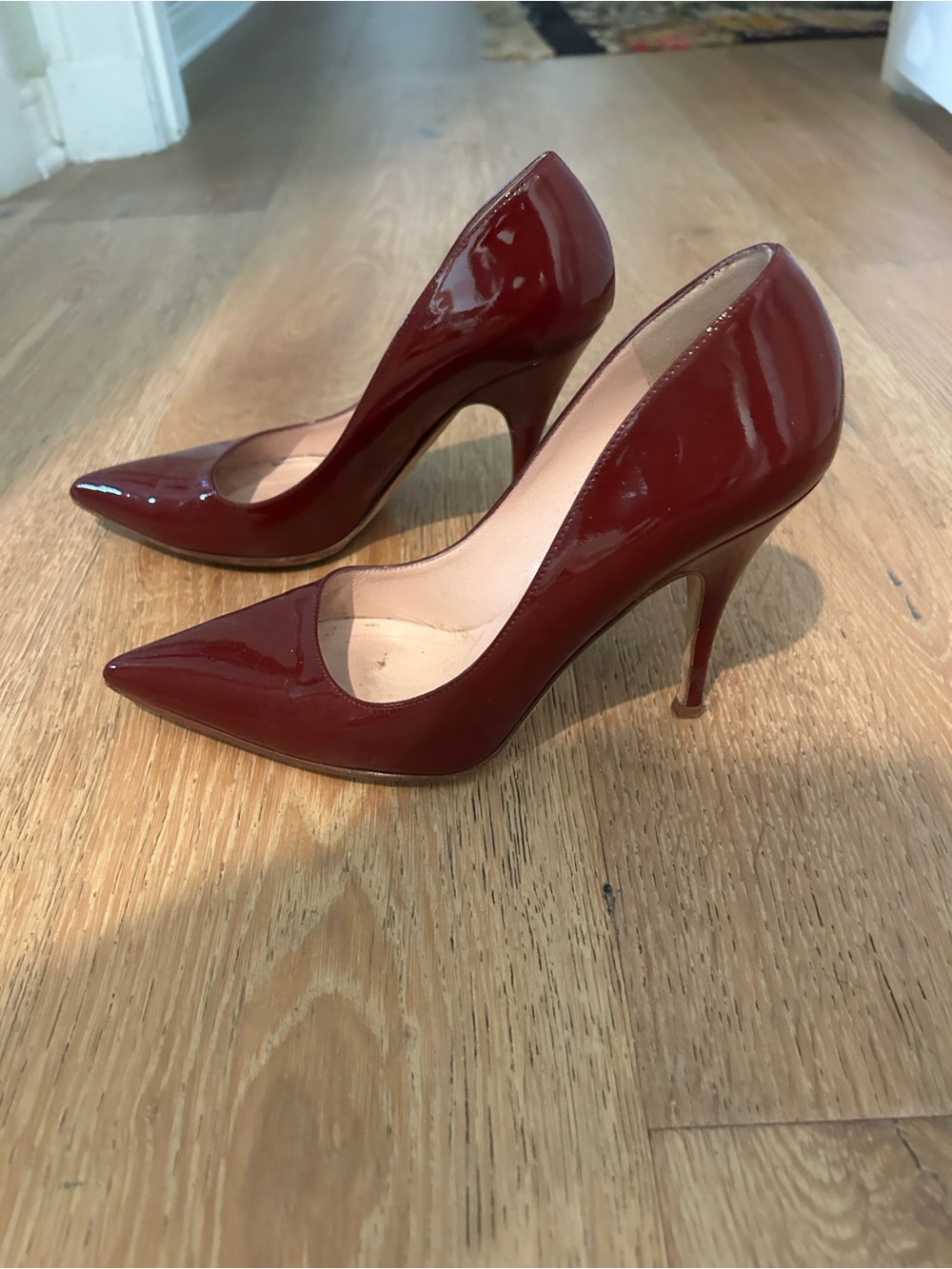 KATE SPADE burgundy pointed toe heels.